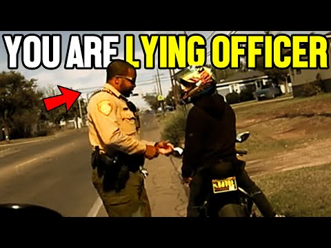 Biker OWNS Corrupt Cop After ILLEGAL Traffic Stop!